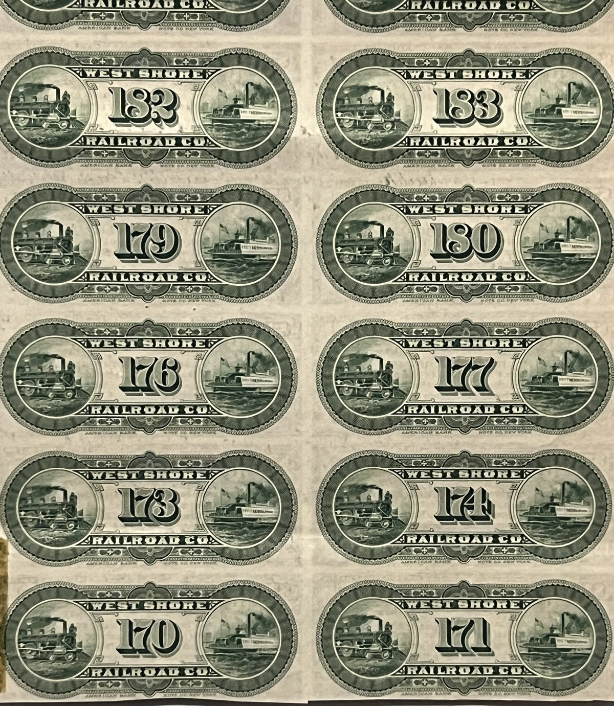 Sheet of ten green printed West Shore Railroad Co. bond coupons numbered 173-183, showing steam locomotives and steamboat vig
