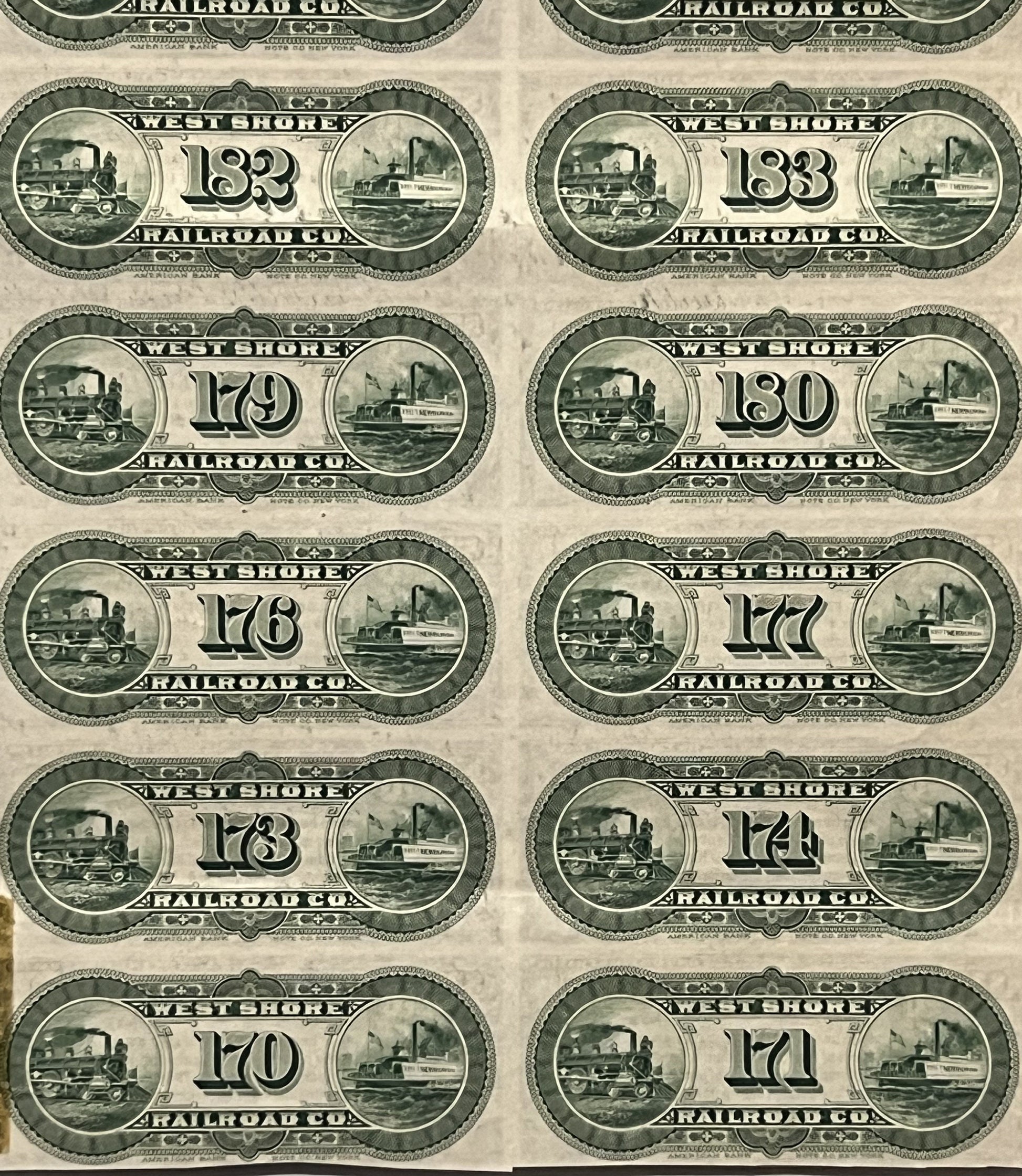 Sheet of ten green printed West Shore Railroad Co. bond coupons numbered 173-183, showing steam locomotives and steamboat vig