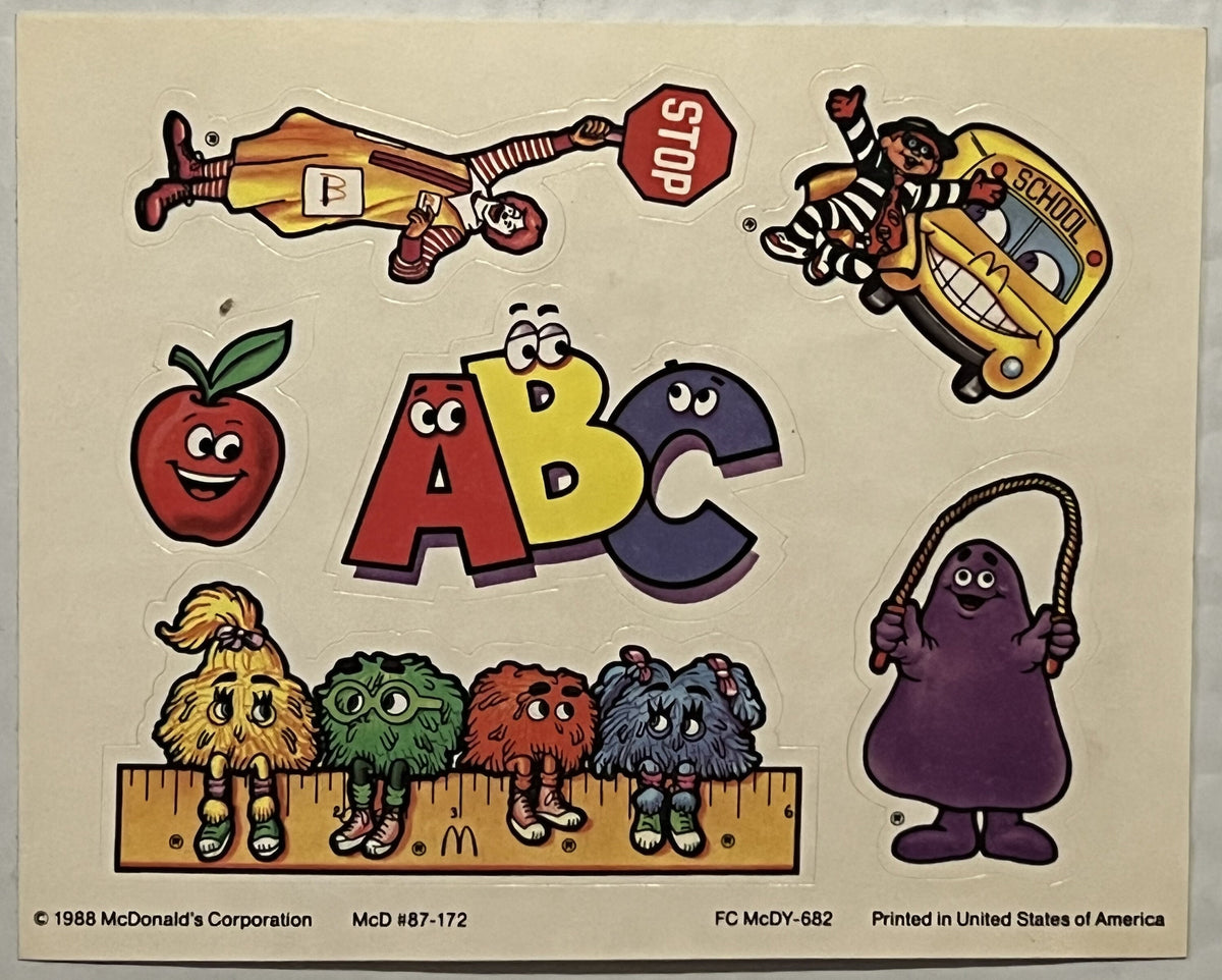 Vintage 1988 McDonald's sticker sheet featuring McDonaldland characters including Ronald, Officer Big Mac, an apple