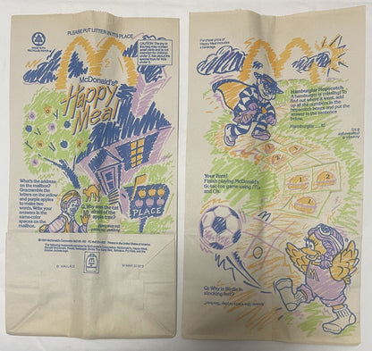 Unfolded McDonald's Happy Meal bag from 1991 showing front and back panels with Ronald McDonald, Hamburglar, and Birdie chara