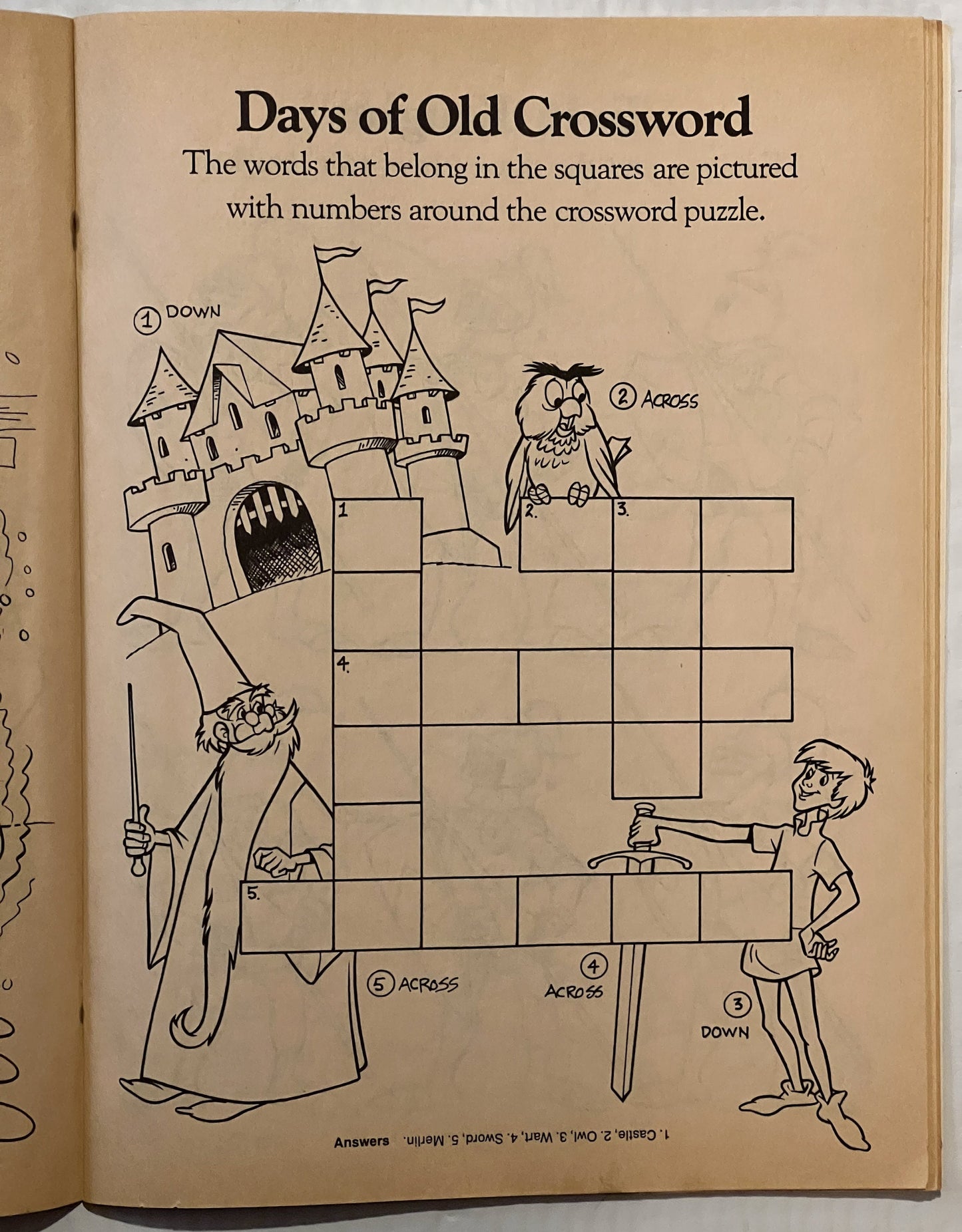 Vintage crossword puzzle page from Disney's Sword in the Stone activity book featuring castle, owl, wizard, and knight illust