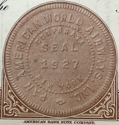 Oval engraving with crosshatch pattern from American Bank Note Company stock certificate, brown ink on cream paper