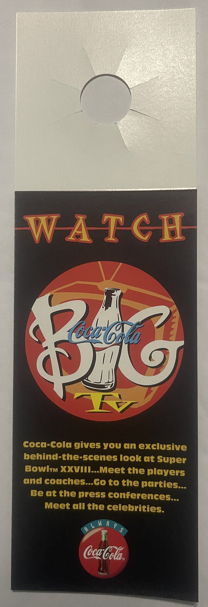 Vintage Coca-Cola Super Bowl XXVIII door hanger with red circular logo, white script lettering, and yellow text on black back