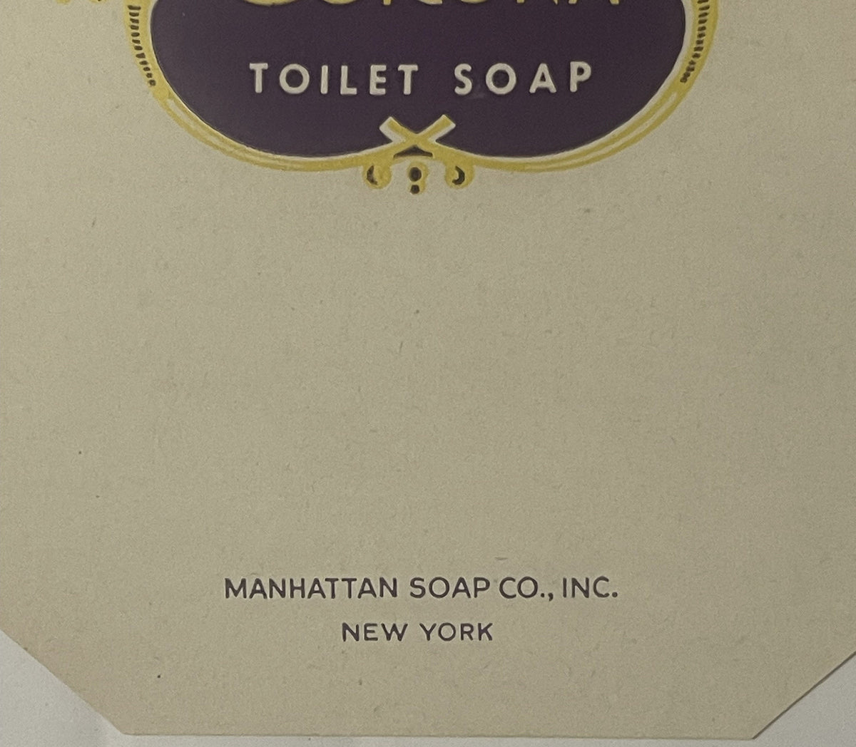 Close-up of the Corona label's lettering: CORONA, TOILET SOAP and MANHATTAN SOAP CO., INC. NEW YORK