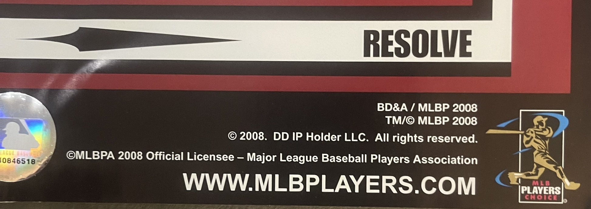 Close-up of poster bottom edge showing "RESOLVE" text, MLB licensing information, website, and Players Choice logo with holog