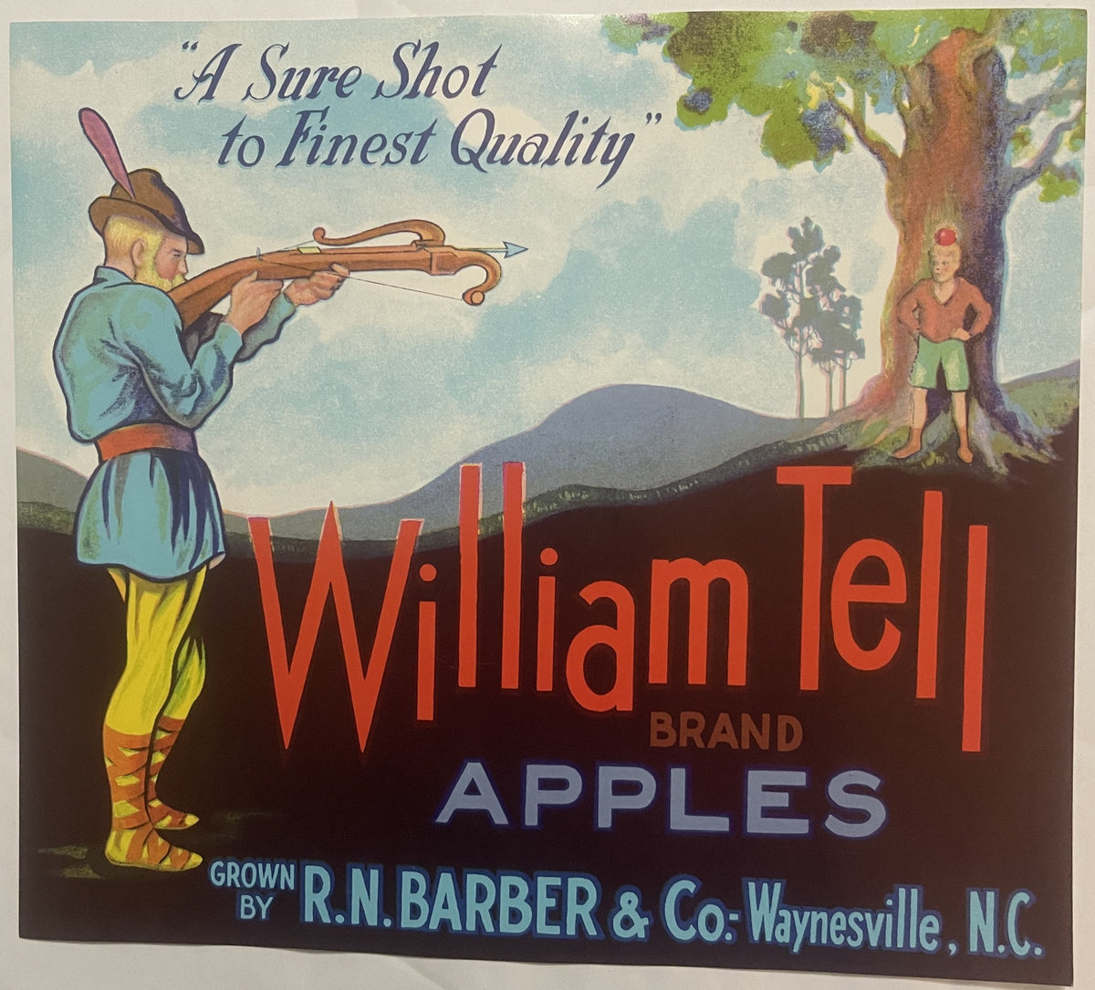 Vintage William Tell Brand apples crate label with archer aiming at boy by tree, mountains in background, chromolithograph pr
