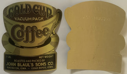 Front and back of embossed gold coffee label showing cup design, "Gold Cup Vacuum Pack Coffee" text, and "John Blaul's Sons C