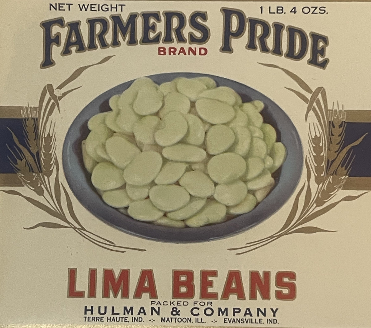 Vintage Farmers Pride brand lima beans label with wheat stalks, cream-colored beans in blue bowl, packed for Hulman & Company