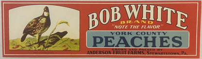 Vintage Bob White Brand peach crate label featuring a quail illustration and red background with blue and cream
