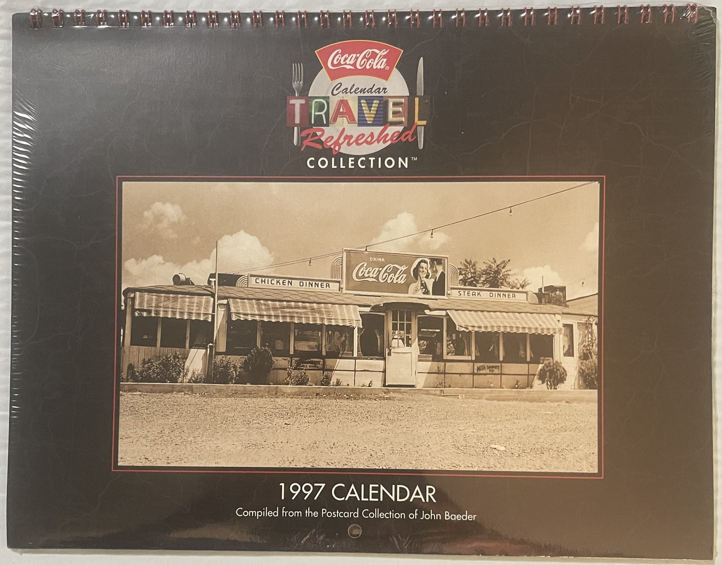 Sealed 1997 Coca-Cola Travel Refreshed Collection calendar featuring vintage diner with Coca-Cola signage, spiral-bound with 