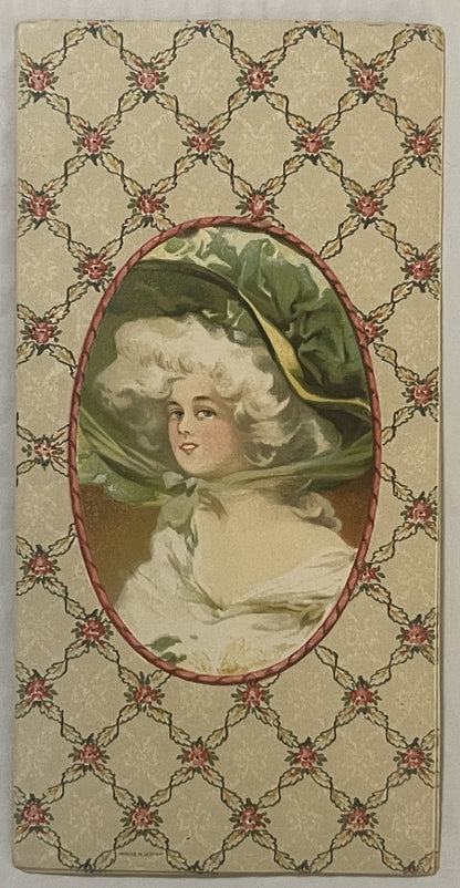 Antique chromolithograph insert featuring a pale-skinned woman in white dress and green bonnet with yellow ribbon, centered i