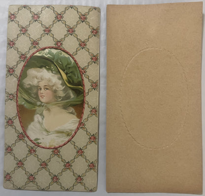 Front and back of antique candy box insert with chromolithograph of woman wearing green silk bonnet and powdered wig in oval 