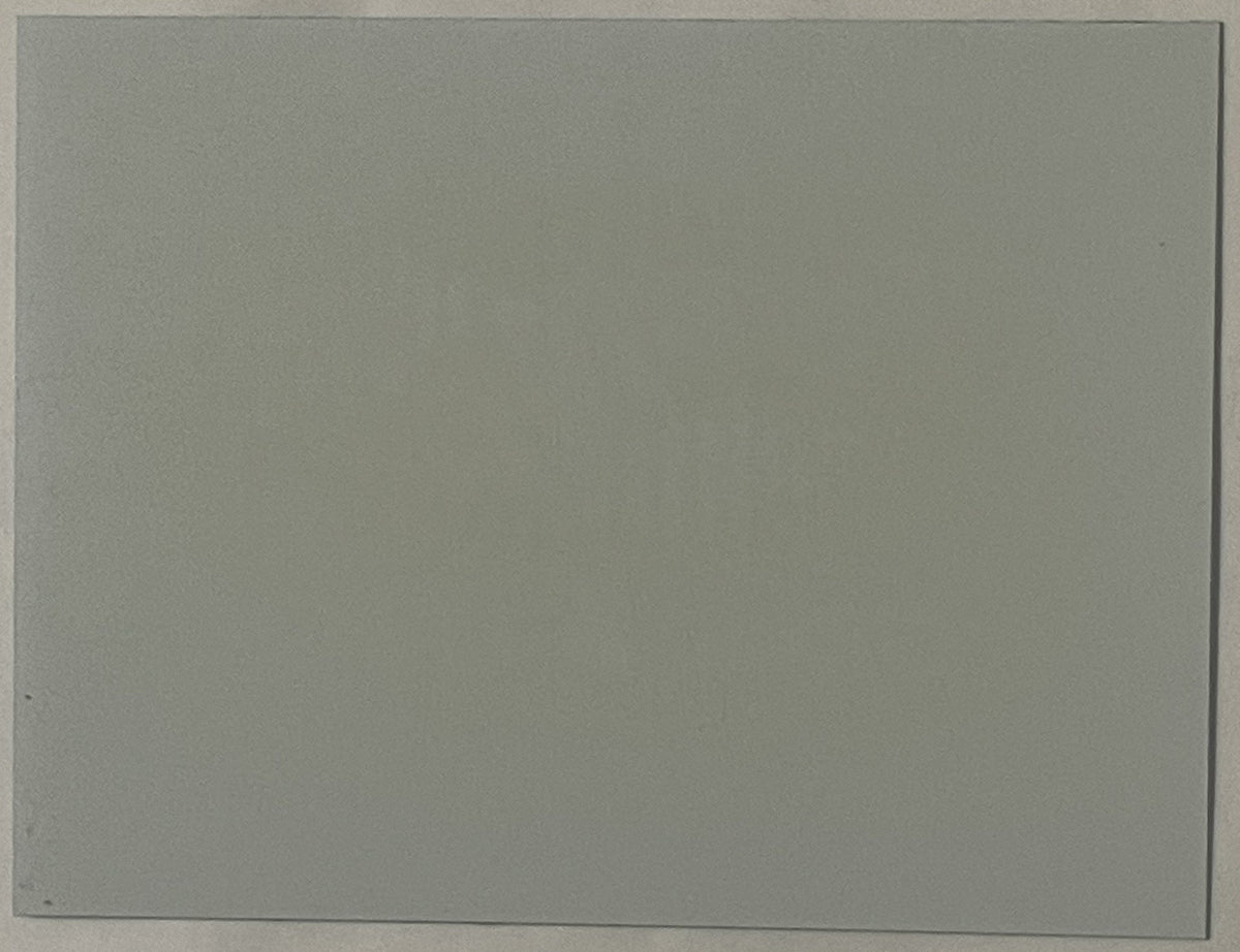 Blank gray rectangular card or lenticular surface photographed straight-on against white background