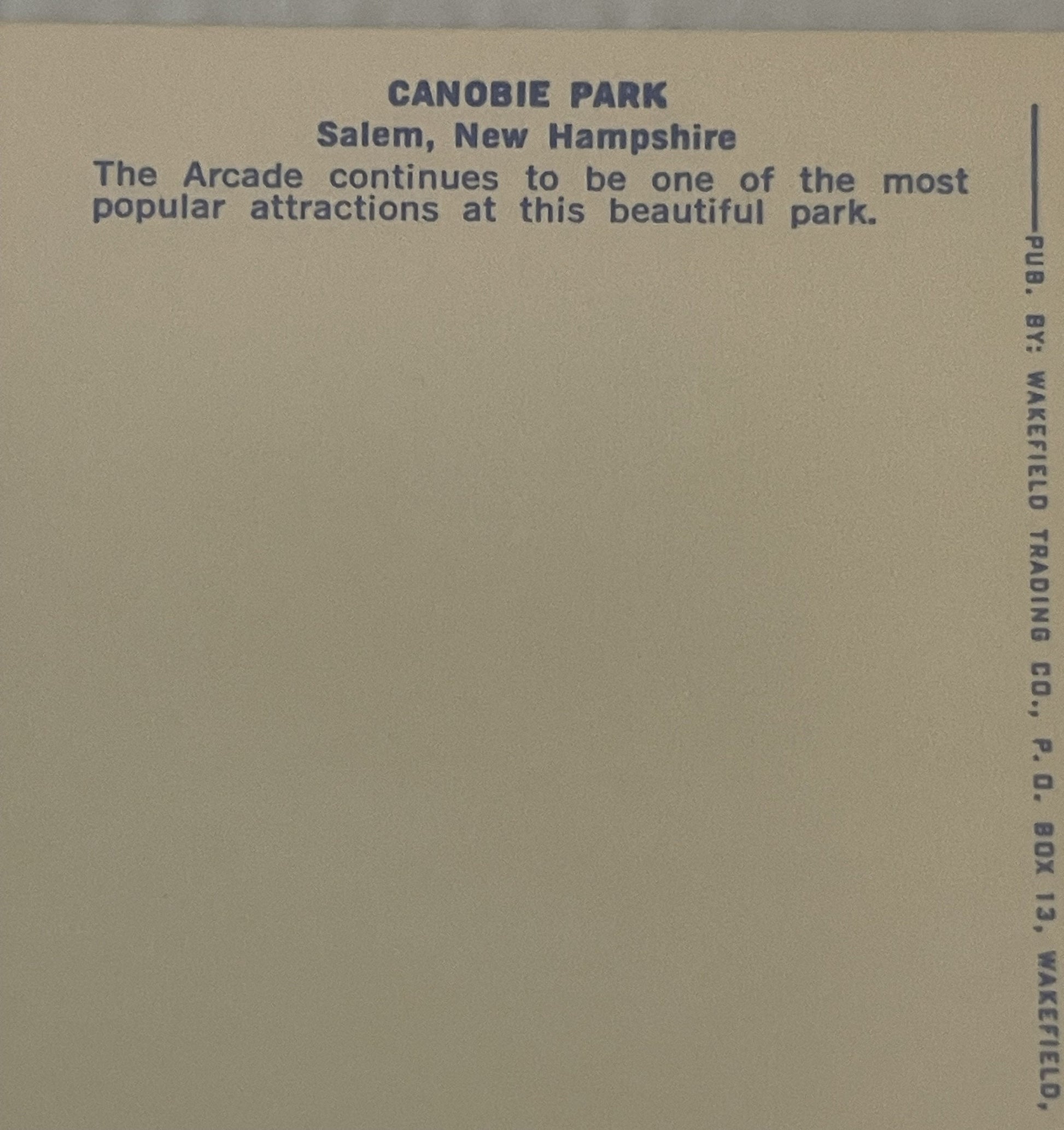 Back of vintage postcard with tan background, blue text reading "CANOBIE PARK Salem, New Hampshire" and description of arcade