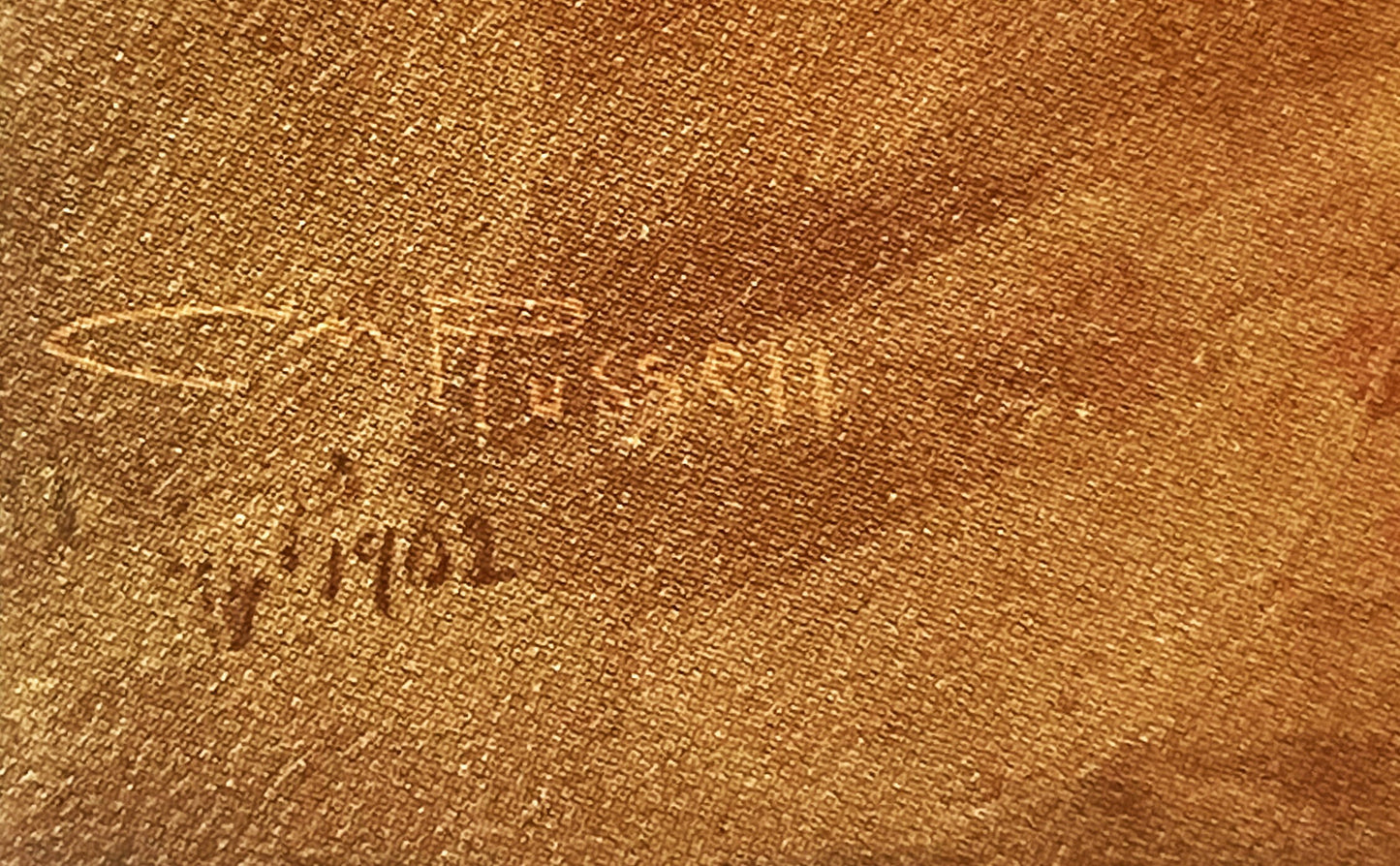 Close-up of tan linen fabric showing embossed text reading "Charles M. Russell" with woven texture visible