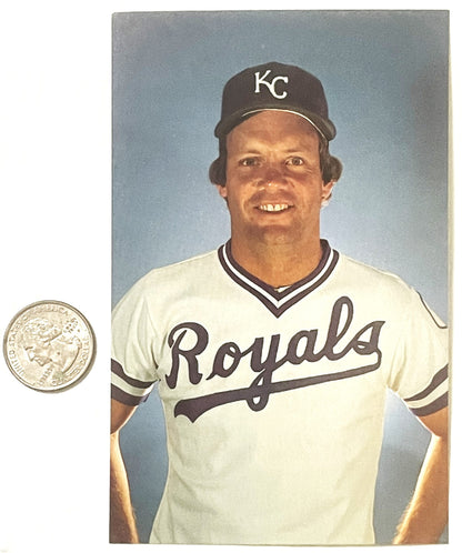 Vintage baseball postcard of Kansas City Royals player in cream uniform with "Royals" script across chest, wearing KC cap, wi