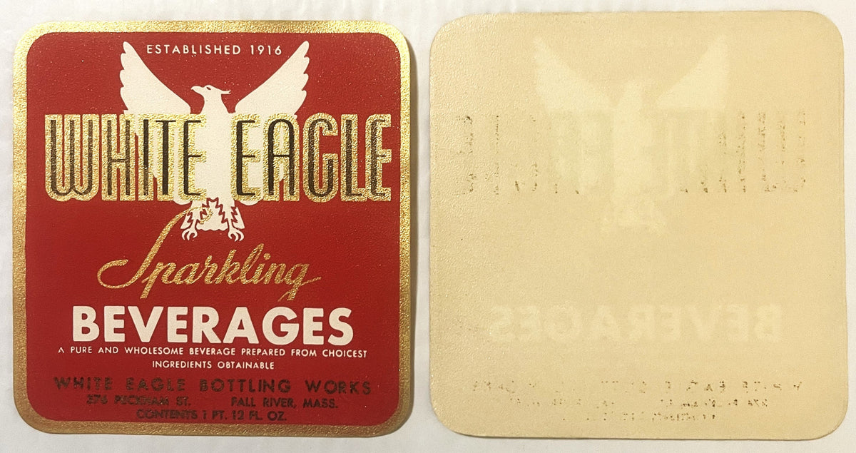 Vintage gold-embossed White Eagle sparkling beverages label from Fall River, showing red front and cream back side