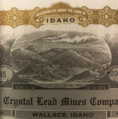 Sepia-toned stock certificate header showing mountainous landscape with "Incorporated Under the Laws of Idaho" text and "Crys