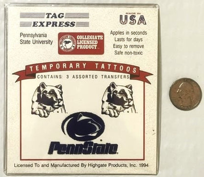 Vintage 1994 Penn State temporary tattoo package with Nittany Lions logo and coin for scale, displayed flat