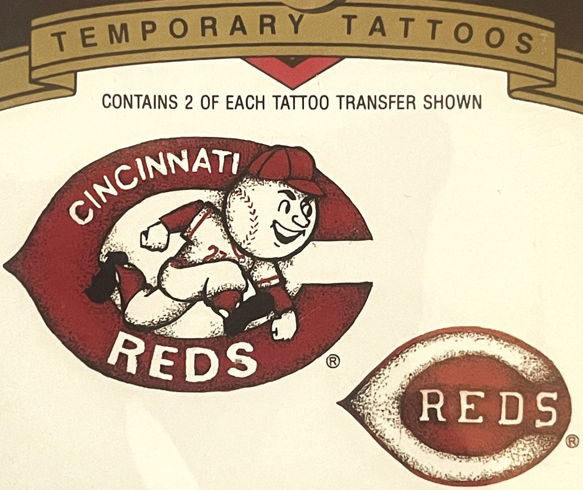 Vintage 1992 Cincinnati Reds temporary tattoo package showing Mr. Red mascot logo and smaller Reds oval logo on cream backgro
