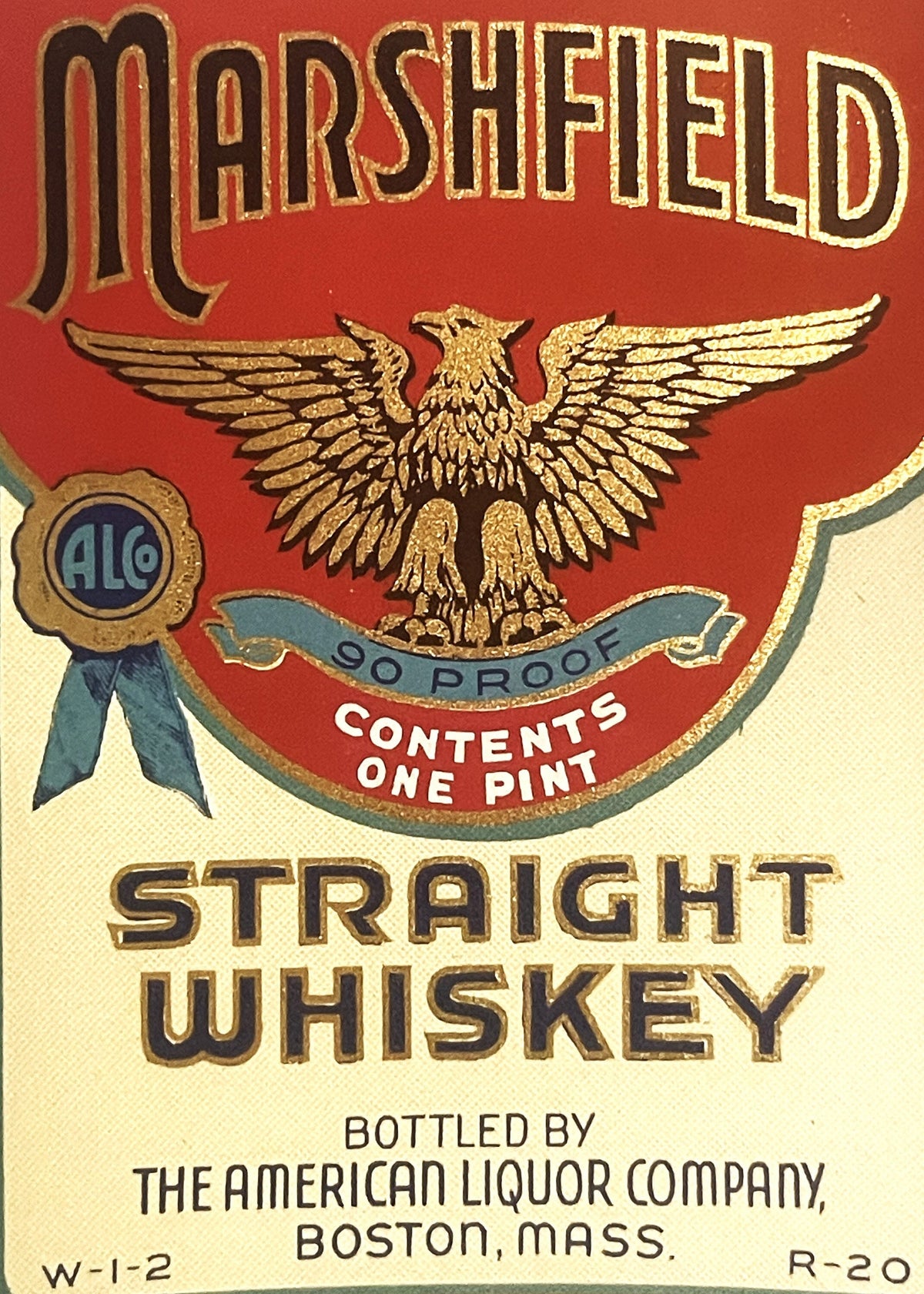 Vintage Marshfield Straight Whiskey label with gold eagle, red background, bottled by American Liquor Company, Boston, MA