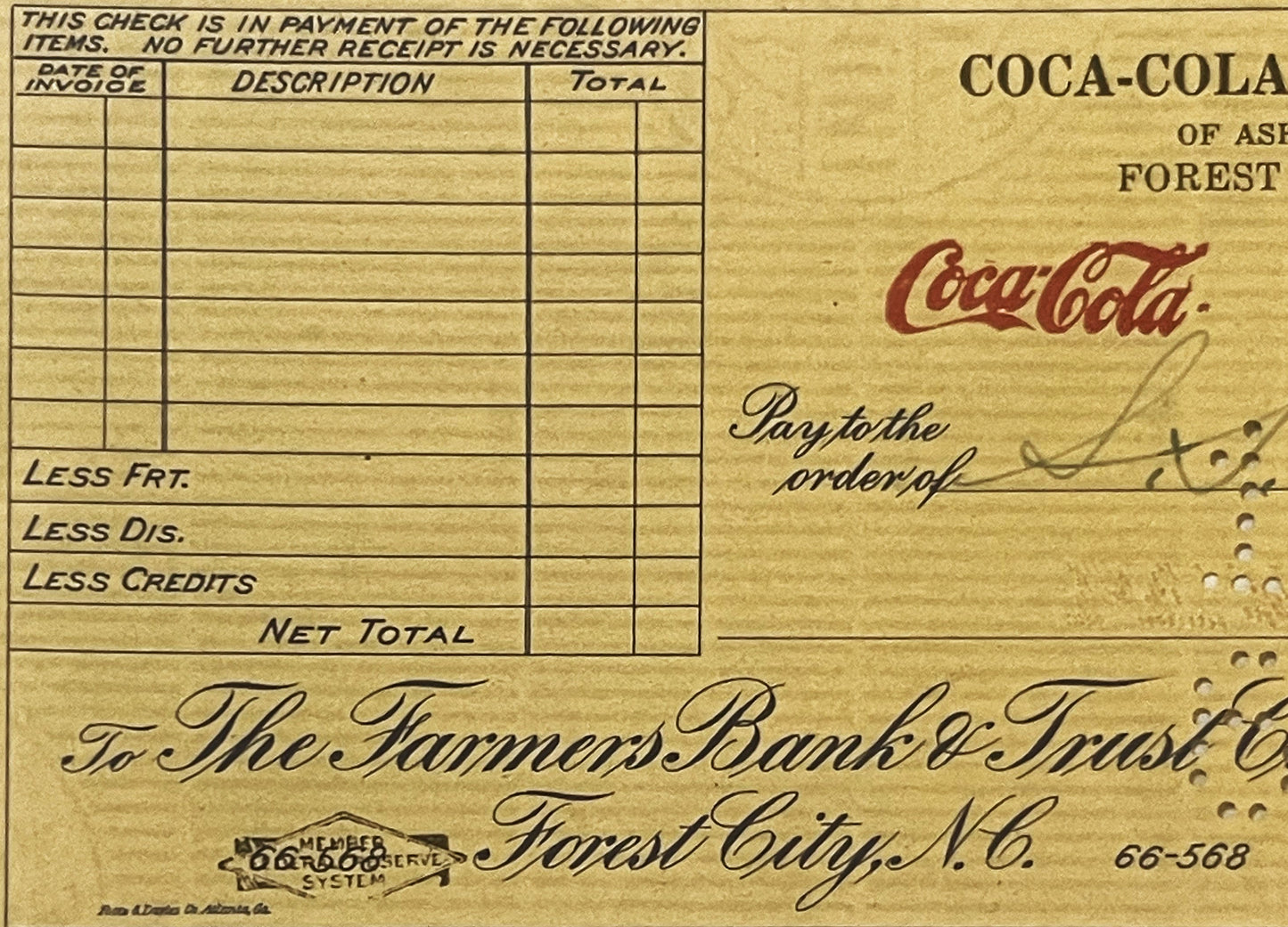 Vintage Coca-Cola bank check from Forest City, NC with blank line items, handwritten signature, and Federal Reserve System st