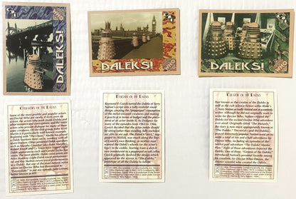Three vintage 1994 Doctor Who Daleks foil trading cards with colored borders showing Daleks in London scenes, accompanied by 