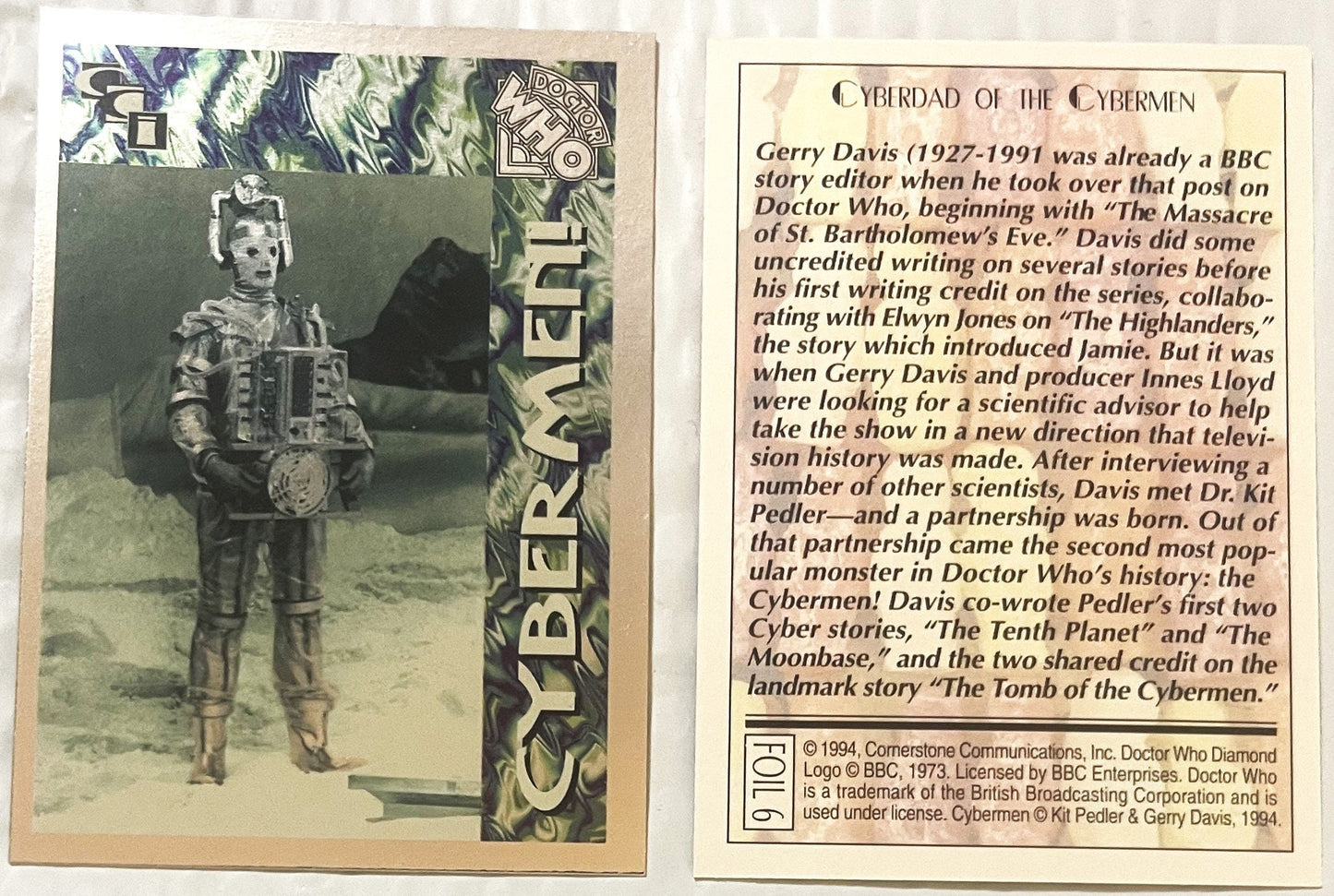 Front and back of 1994 Doctor Who trading card #6 featuring a silver Cyberman figure in costume on left, with descriptive tex