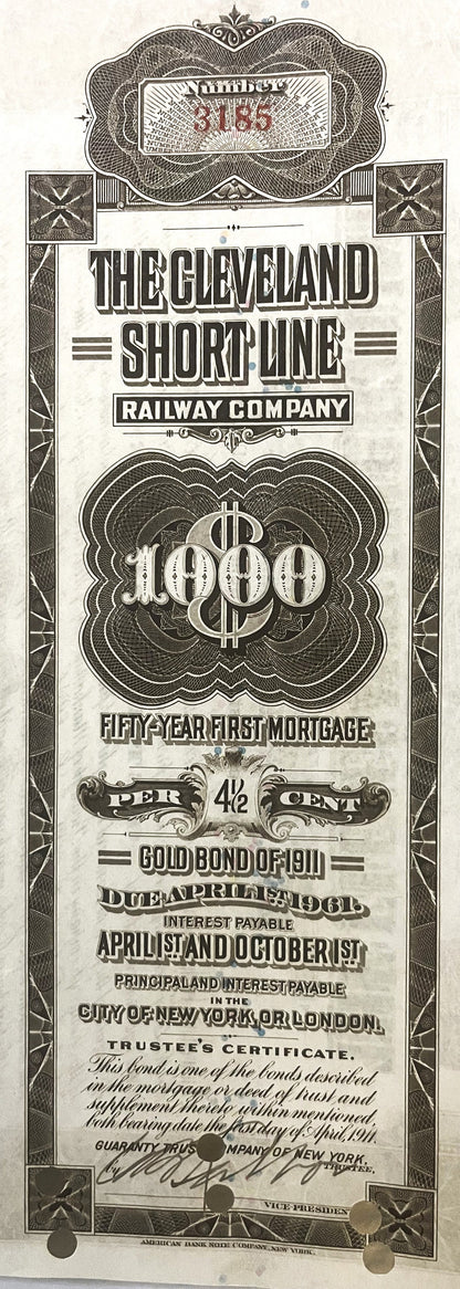 Antique 1911 Cleveland Short Line Railway $1000 gold bond certificate with ornate engraved borders and decorative text on age