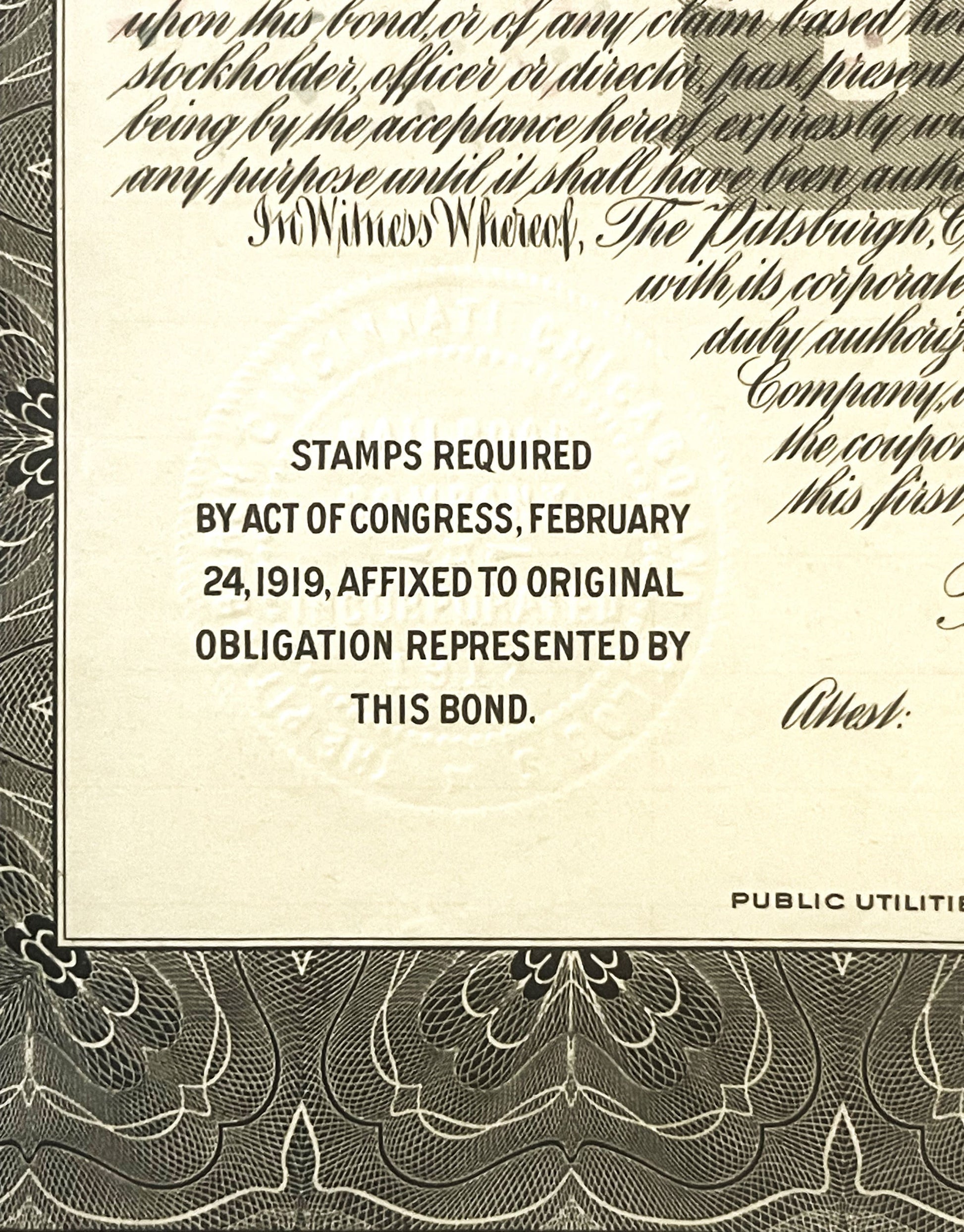 Close-up of vintage bond document showing printed text about stamps required by Act of Congress, February 24, 1919, with deco