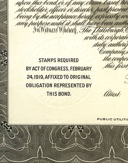 Close-up of vintage bond document showing printed text about stamps required by Act of Congress, February 24, 1919, with deco