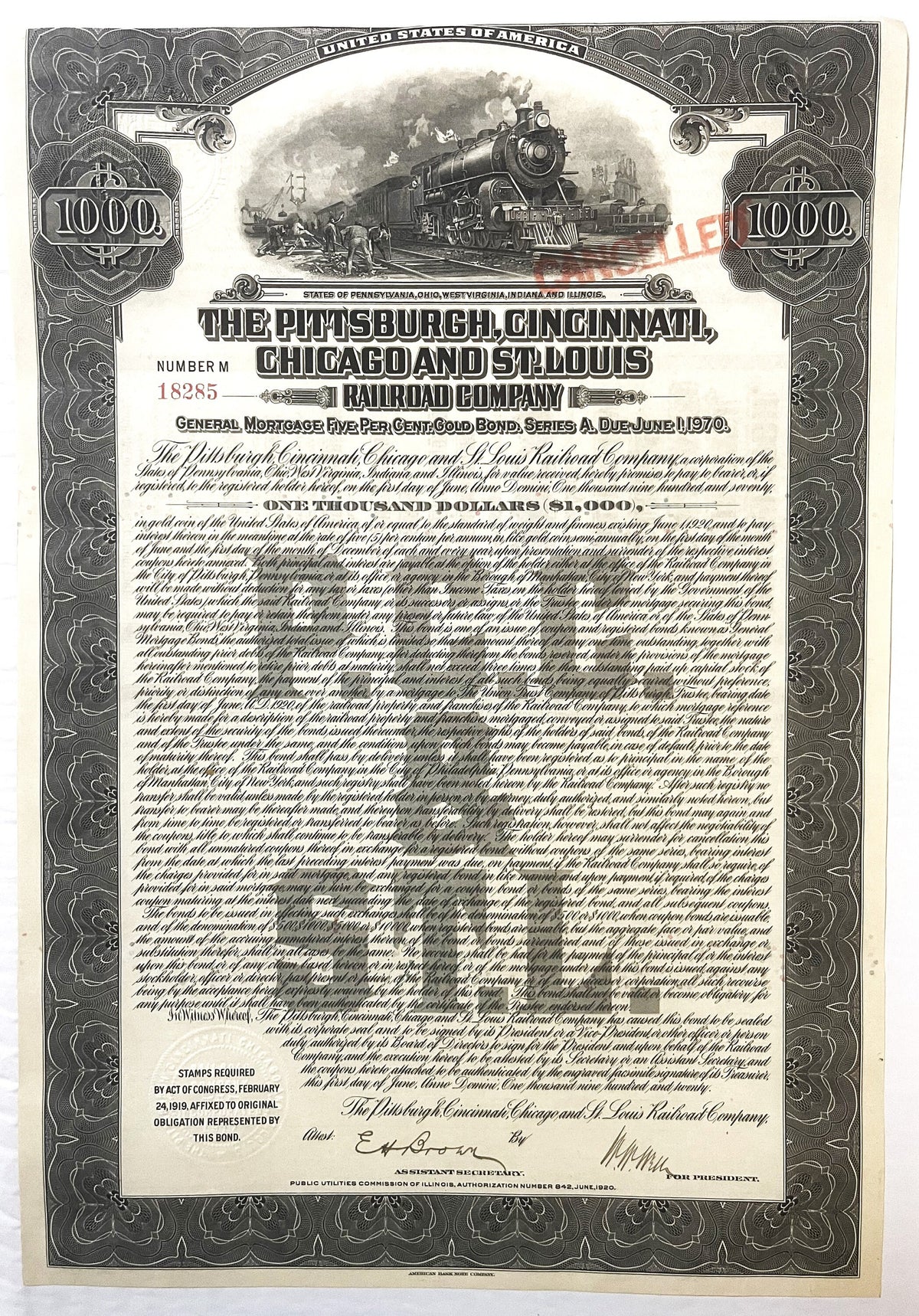 Full-page 1920 railroad bond certificate for Pittsburgh, Cincinnati, Chicago and St. Louis with ornate border, steam locomoti