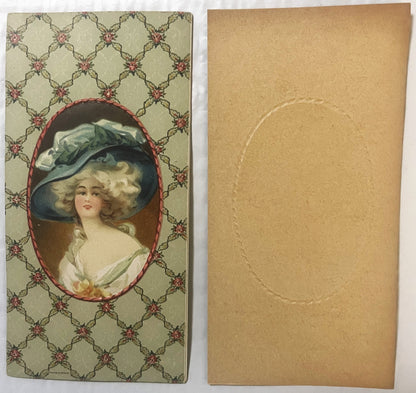 Antique chromolithograph candy box insert showing front and back: woman in large blue hat with plume on cream patterned backg