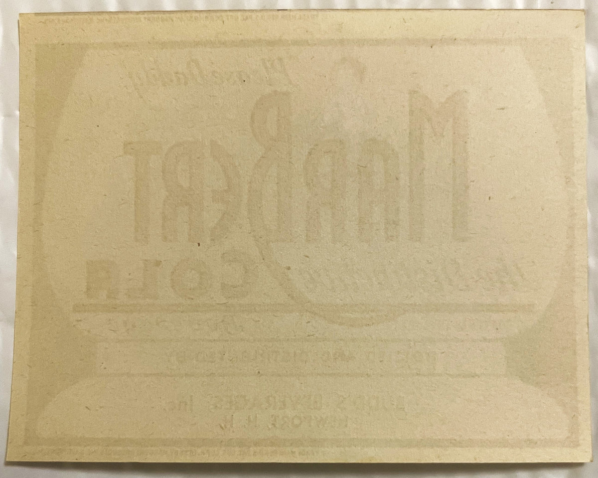 Back of the Marbert Cola label, blank paper with the front printing faintly showing through in reverse