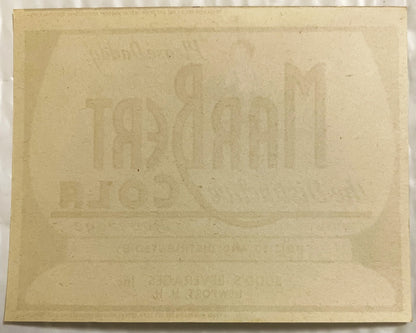 Back of the Marbert Cola label, blank paper with the front printing faintly showing through in reverse