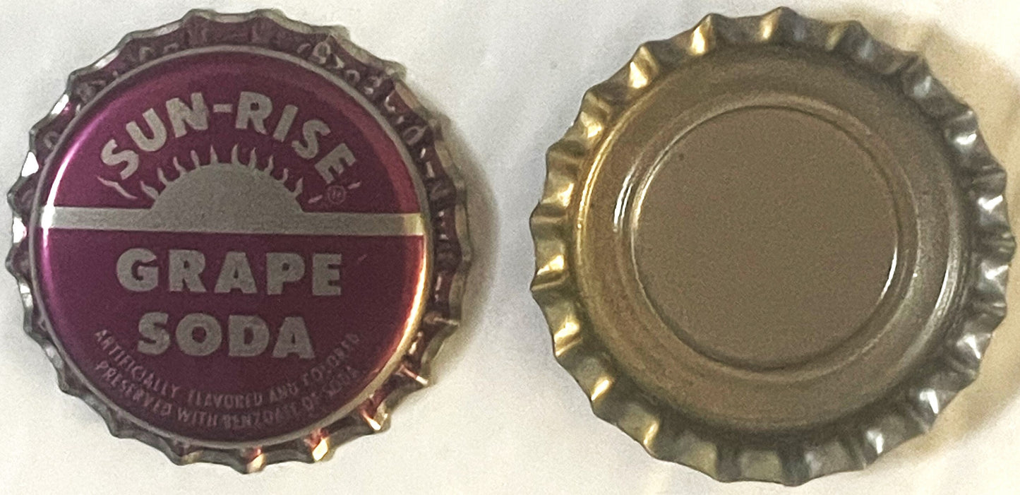 Vintage Sun-Rise Grape Soda bottle cap showing purple front with sunrise logo and text, and plain metallic back side