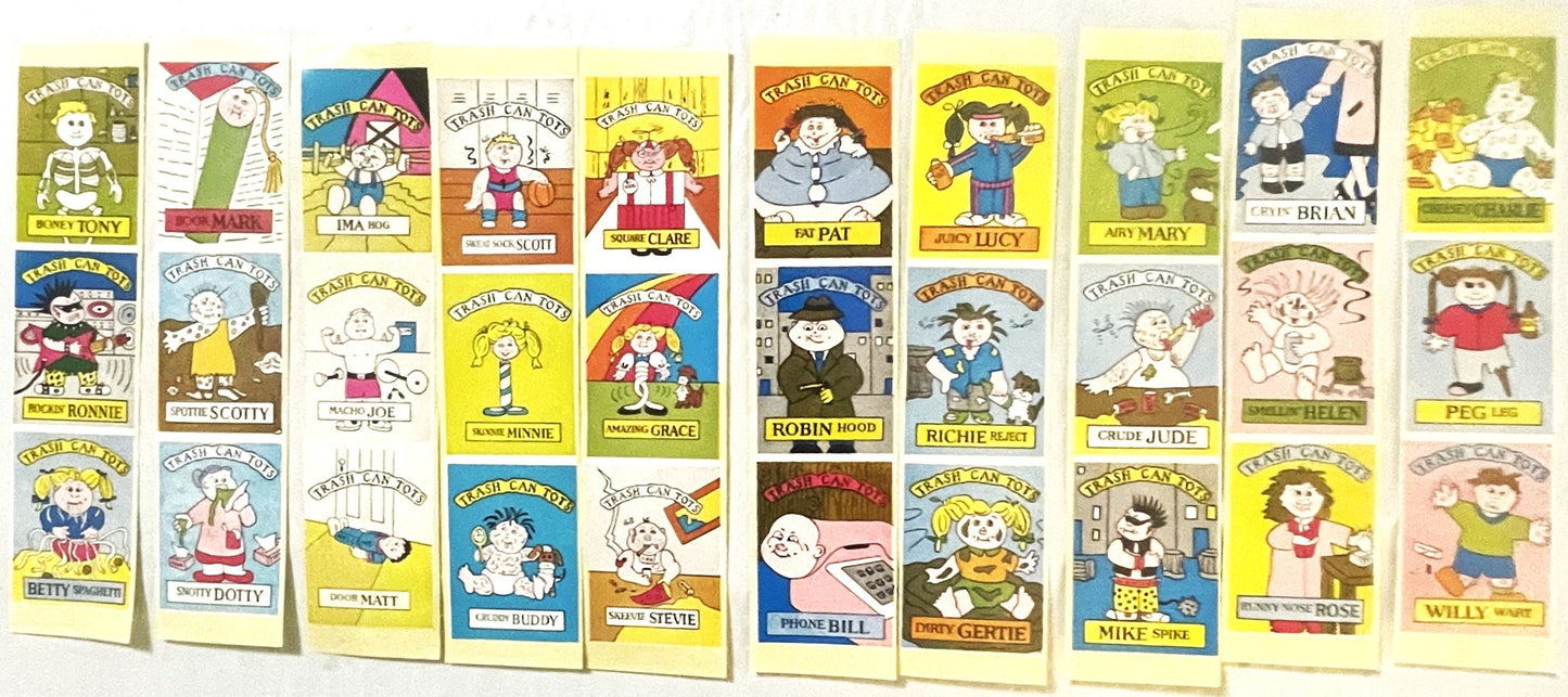 Collection of colorful Trash Can Tots sticker cards arranged in folded display panels, showing cartoon character illustration