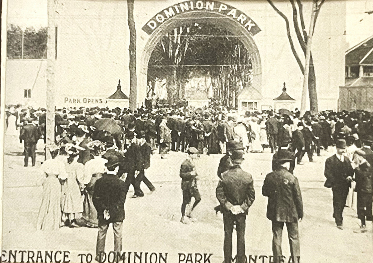 Sepia-toned postcard showing crowds of visitors at Dominion Park entrance in Montreal, with ornate archway and "Park Opens" s