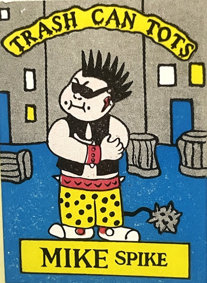 Vintage "Trash Can Tots" sticker featuring Mike Spike character with spiky black hair, eye patch, and yellow polka dot shorts