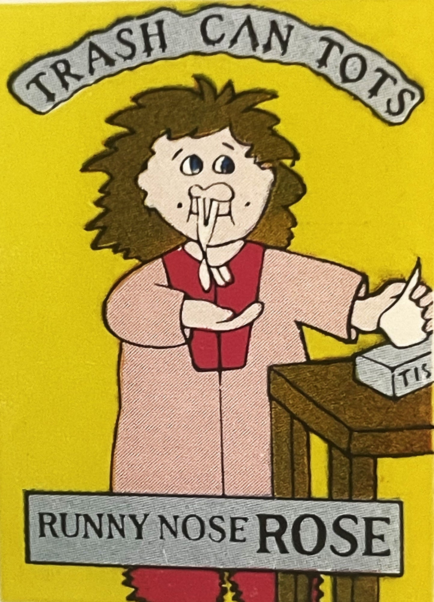 Vintage sticker featuring cartoon character with brown spiky hair and runny nose, wearing pink coat and red shirt, with "Tras