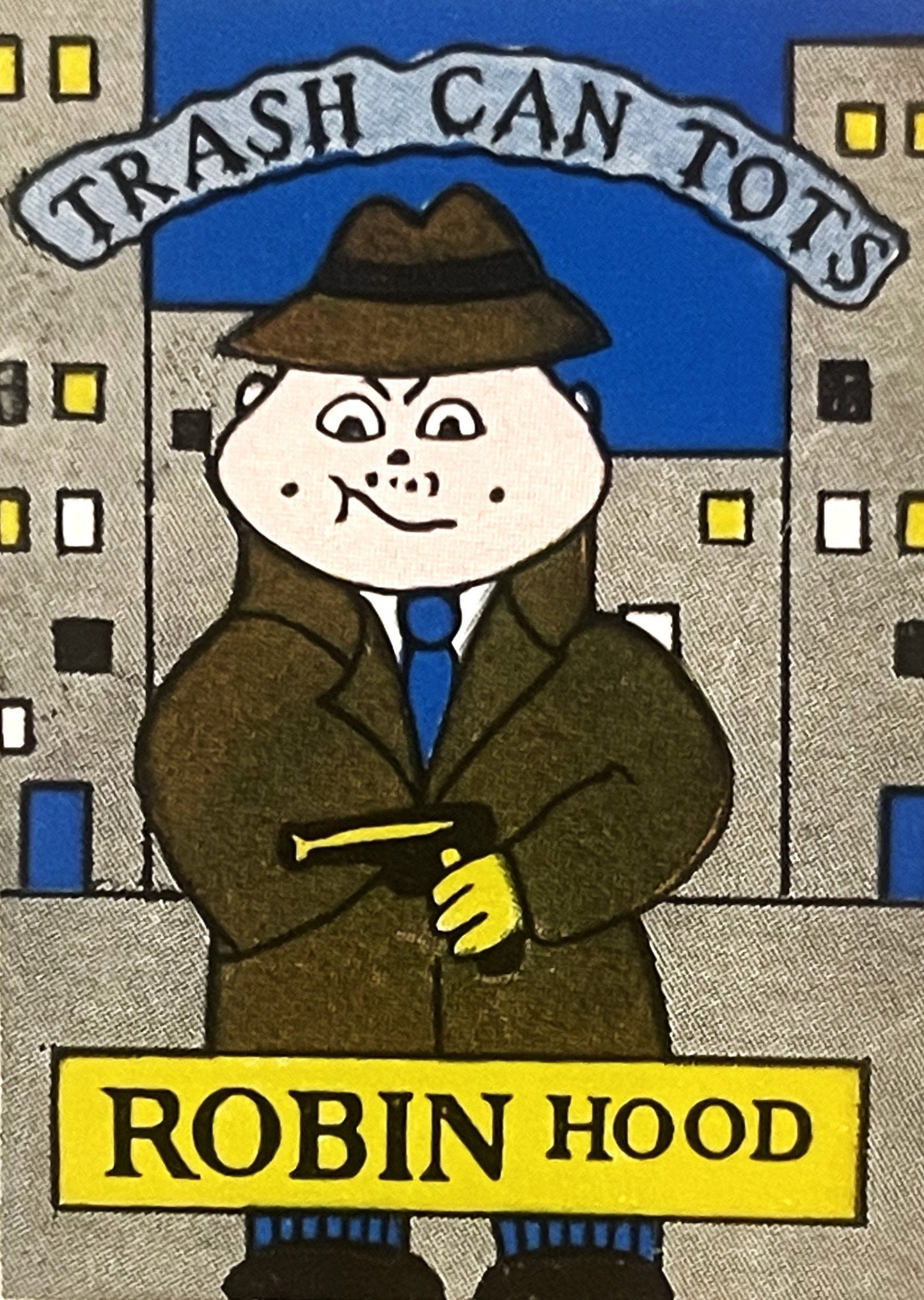 Vintage sticker of a cartoon character labeled "Robin Hood" wearing a brown coat and hat, holding a yellow object, against a 
