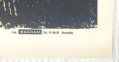 Close-up of vintage movie poster bottom edge showing "Imp. WAGRAM Tel. 17.48.61 Bruxelles" printer credit on cream paper agai