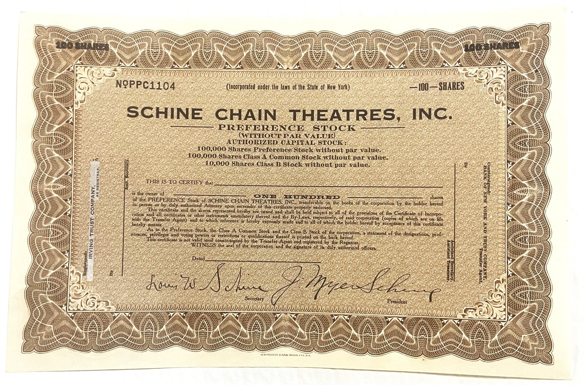 Vintage stock certificate for Schine Chain Theatres, Inc. preference shares from 1920s, tan and brown ornate border with prin