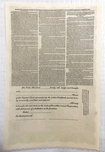 Cream-colored stock certificate page with dense printed text at top and blank transfer form below with signature lines and da