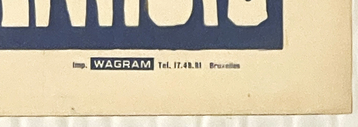 Close-up of poster corner showing cream background with dark blue banner containing "Imp. WAGRAM Tel. 17.48.81 Bruxelles"