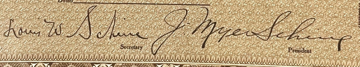 Close-up of handwritten signatures on aged beige document with "Secretary" and "President" printed labels visible