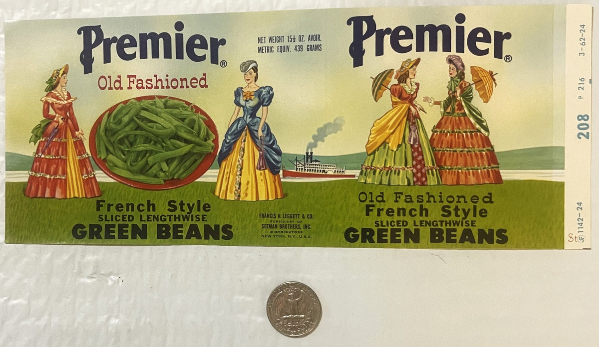Vintage Premier green beans can label featuring Victorian ladies in period dress with a steamboat, next to a quarter for scal