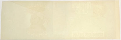Blank cream back of the Maryland Chief label with the front design faintly showing through
