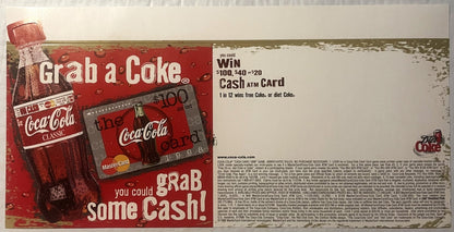 Vintage 1998 Coca-Cola promotional display with red background showing classic bottle, MasterCard ATM card, and "Grab a Coke 