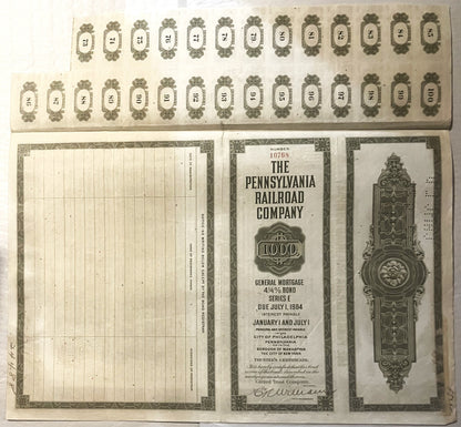 Vintage Pennsylvania Railroad bond certificate and coupon sheet from 1934, showing ornate border designs and numbered coupons